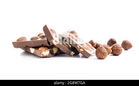 Nutty chocolate with hazelnuts isolated on white background. Stock Photo
