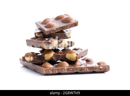 Nutty chocolate with hazelnuts isolated on white background. Stock Photo