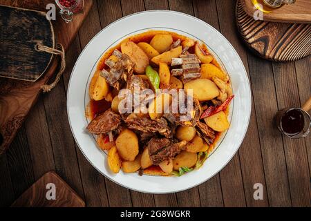 Uzbek dish kazan kabob with lamb and potatoes Stock Photo