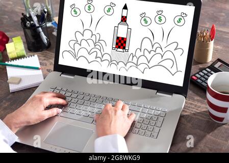 Start up concept shown on a laptop screen Stock Photo