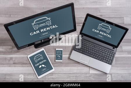 Car rental concept shown on different information technology devices Stock Photo