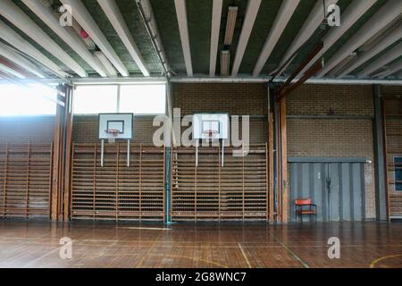 an empty classic wooden style gymnasium in an english secondary school in london england UK Stock Photo