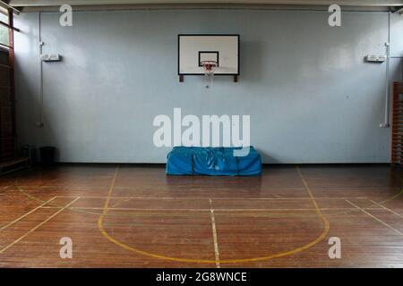 an empty classic wooden style gymnasium in an english secondary school in london england UK Stock Photo