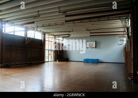 an empty classic wooden style gymnasium in an english secondary school in london england UK Stock Photo