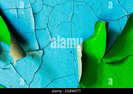 stone wall with old green and blue paint. Grunge texture. High quality photo Stock Photo