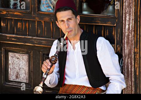 Local man smoking water pipe in Sarajevo, Bosnia and Herzegovina Stock Photo