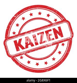 KAIZEN text on red grungy vintage round rubber stamp. Stock Photo