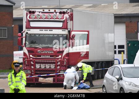 File photo dated 23/10/19 of police activity at the Waterglade Industrial Park in Grays, Essex, after 39 bodies were found inside a lorry container on the industrial estate. Romanian Alexandru-Ovidiu Hanga, 29, of Hobart Road in Essex, a member of a people-smuggling gang linked to the deaths of the 39 Vietnamese men, women and children has been ordered to pay the bereaved families £3,000. Issue date: Friday July 23, 2021. Stock Photo
