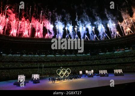 Tokyo, Japan. 23rd July, 2021. Olympics: Opening ceremony at the Olympic Stadium. Fireworks explode over the Olympic rings. Credit: Swen Pförtner/dpa/Alamy Live News Stock Photo