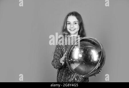 Metallic shining. Birthday girl. Happy child celebrate birthday. Small kid hold air balloon. Birthday anniversary celebration. Birthday party copy Stock Photo