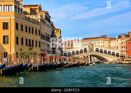 Great view of famous bridge of Rialto or ponte di Rialto over Grand Canal, Venice, Italy. Iconic travel destination of UNESCO world heritage city Stock Photo