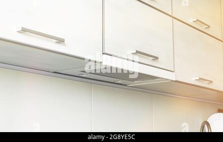 Cooker hood in modern kitchen interior, kitchen applicance concept background Stock Photo
