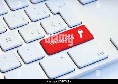 Privacy word and key icon on red computer keyboard Stock Photo
