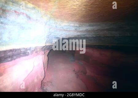 artificial cave under earth journey. wild cave, forgotten passages deep underground Stock Photo