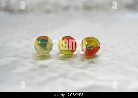 Kids Marbles. Colorful glass made Marbles. Glass Marbles. Stock Photo