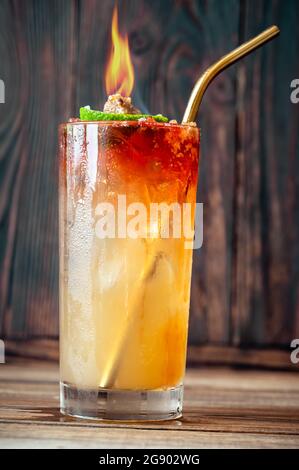 Glass of Holy water cocktail on the wooden background Stock Photo