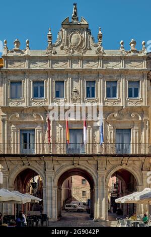 facade of the town hall with umbrellas, tables and chairs of bars and restaurants in the main square of the city of Cuenca, Castilla la Mancha, Spain, Stock Photo