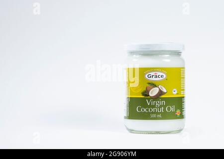 A container of Grace coconut oil isolated on a white background. Stock Photo