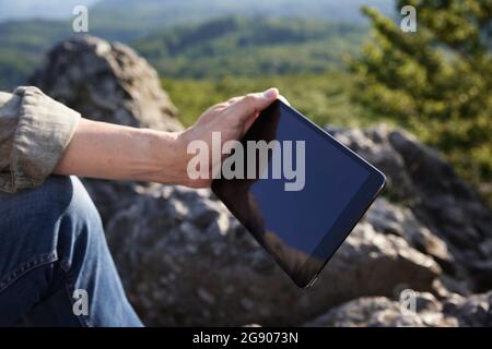 Man holding digital tablet Stock Photo