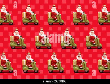 Pattern of Santa Claus Christmas ornaments against vibrant red checked background Stock Photo