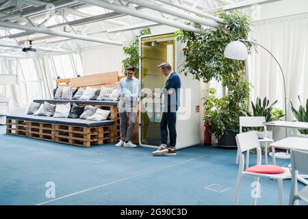 Male professional team using digital tablet in office Stock Photo