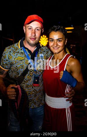 Ukraine's boxing champion and world kick boxing vice-champion Lera Eroshenko with her coach Victor Balabko after beating Katya Rogova in July 2020. Stock Photo