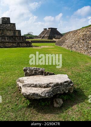 Rock on grass at El Tajin, Veracruz, Mexico Stock Photo