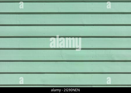 wooden painted planks surface. greenish aquamarine timber wall texture for background or wallpaper Stock Photo