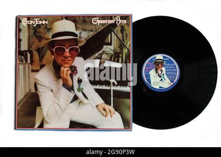 Pop and rock artist, Elton John music album on vinyl record LP disc. Titled: Greatest Hits album cover Stock Photo