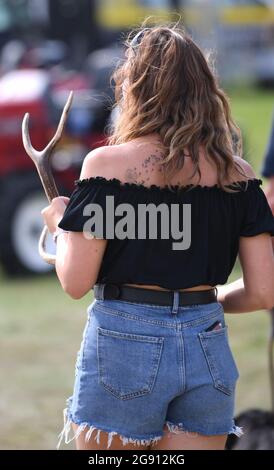 Ragley Hall, Warwick, Warwickshire, UK. 23rd July, 2021. The Game Fair Exhibition Show; visitors purchase unusual items at the show Credit: Action Plus Sports/Alamy Live News Stock Photo