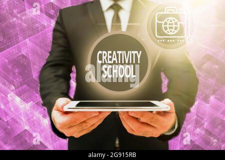 Sign displaying Creativity School. Word for students are able to use imagination and critical thinking Man In Office Uniform Holding Tablet Displaying Stock Photo