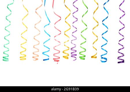 beautiful yellow streamers isolated on white Stock Photo - Alamy