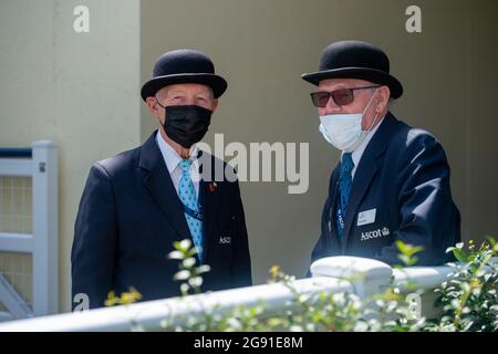 Ascot, Berkshire, UK. 23rd July, 2021. Two stewards wear face masks at they work at the King George Weekend at Ascot Races. Credit: Maureen McLean/Alamy Stock Photo