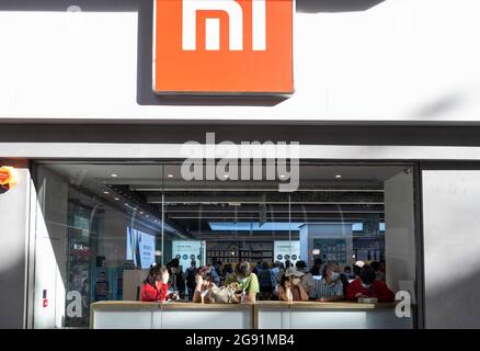 A shopper is seen at the Chinese multinational technology company ...