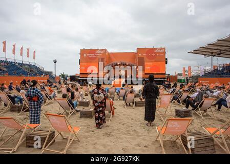 The Hague, Netherlands. 23rd July, 2021. Invited guests seen at the sports beach of The Hague, for the ‘TeamNL Olympic Festival'.H.R.H. King William-Alexander of The Netherlands, officially opened ‘TeamNL Olympic Festival' this morning on the Dutch beach resort of Scheveningen. The resort will be the dedicated venue for the Tokyo Olympics for the next three weeks. The competition can be viewed live and tributes from Olympic medalists took place on the festival grounds. Outside the festival site, is “Tokyo in Town”, where various free sports activities are organized in The Hague. The festival w Stock Photo