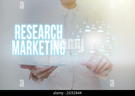 Writing displaying text Research Marketing. Conceptual photo process of gathering and interpreting info about a market Lady Holding Tablet Pressing On Stock Photo