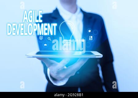 Text caption presenting Agile Development. Business showcase alliance between selforganizing crossfunctional team Lady In Suit Presenting Mobile Stock Photo