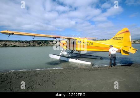 Pilot adjusting position of de Havilland Beaver on the Kejulik River, Kejulik National Wildlife Refuge Alaska Stock Photo