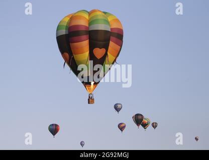 Readington, USA. 24th July, 2021. Hot air balloons take flight at the ...