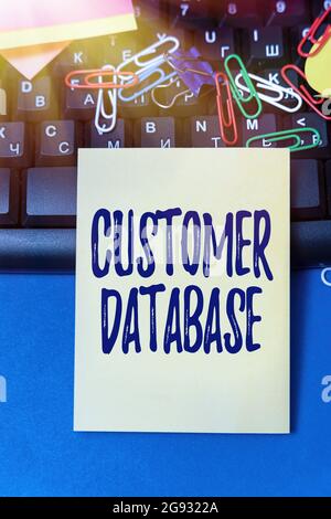 Handwriting text Customer Database. Internet Concept uptodate on customer information records and data Multiple Assorted Collection Office Stationery Stock Photo