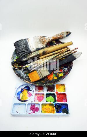 art school supplies Paintbrushes of various sizes, color palettes, acrylic paints