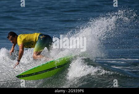 Chiba, Japan. 24th July, 2021. Julian Wilson of Australia rides a wave during a training session at Tsurigasaki beach in Chiba, Japan, July 24, 2021. Credit: Du Yu/Xinhua/Alamy Live News Stock Photo