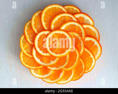 Juicy grapefruit pieces with fresh mint in a bowl, close up Stock Photo
