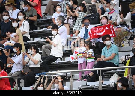 Oyama, Japan. 24th July, 2021. Cycling: Olympics, Tokyo - Oyama (234.00 km), men, road race. Fans are sitting in the stands. Credit: Sebastian Gollnow/dpa/Alamy Live News Stock Photo