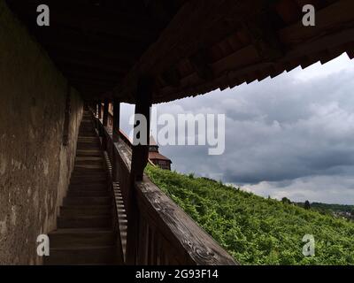 Diminishing perspective of historic roofed passage Seilergang in Esslingen am Neckar, Baden-Württemberg, Germany connecting town center and castle. Stock Photo