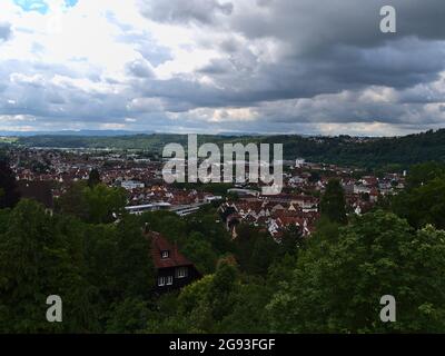 Beautiful panoramic view over the eastern part of town Esslingen em Neckar, Baden-Württemberg, Germany located in a valley surrounded by forests. Stock Photo