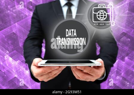 Writing displaying text Data Transmission. Concept meaning sending data electronically over a communications network Man In Office Uniform Holding Stock Photo