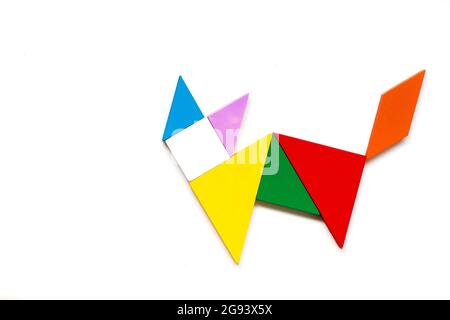 Color wood tangram puzzle in cat shape on white background Stock Photo