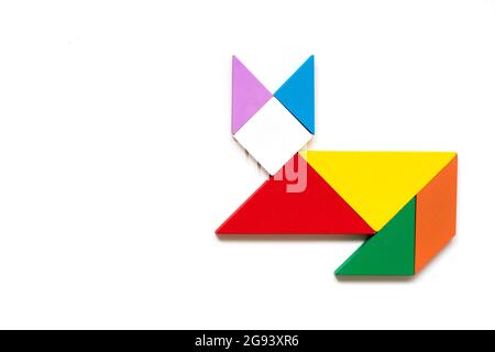 Color wood tangram puzzle in cat shape on white background Stock Photo