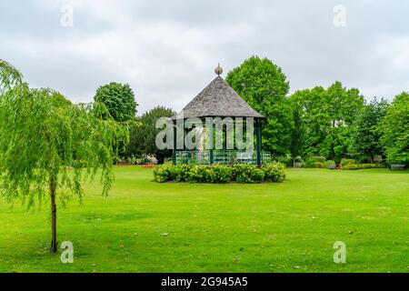 BATH, UK - JUNE 27, 2021: Beautiful garden and pergola in Bath, known for and named after its Roman-built baths Stock Photo